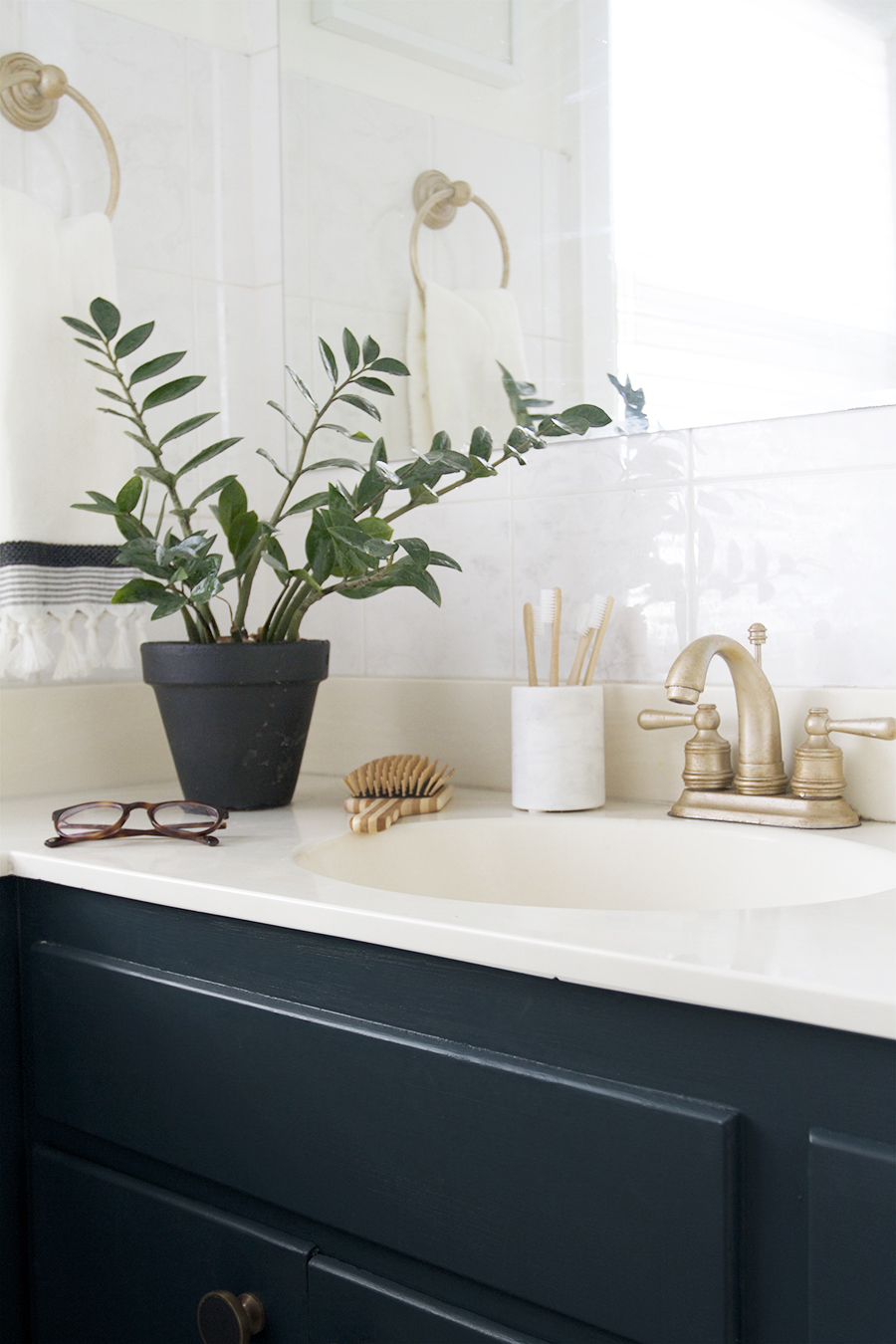 Navy Cabinets and Painted Brass Fixtures