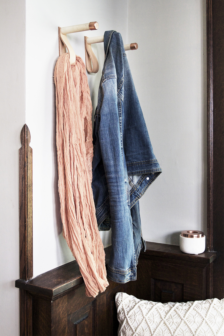 Simple coat hooks made with dowels, leather and copper