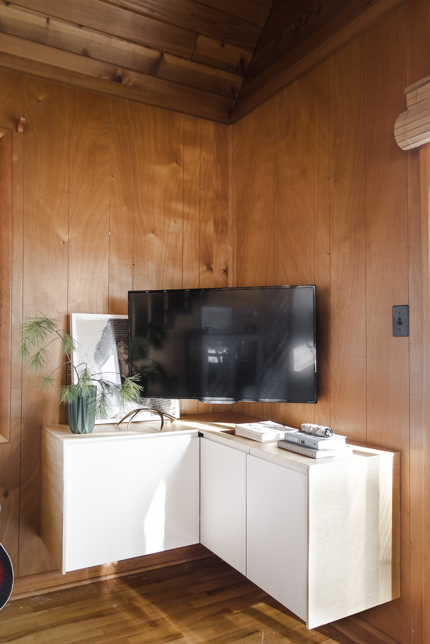 Deucecities Henhouse | Custom Corner TV Credenza using Ikea Kitchen Cabinets