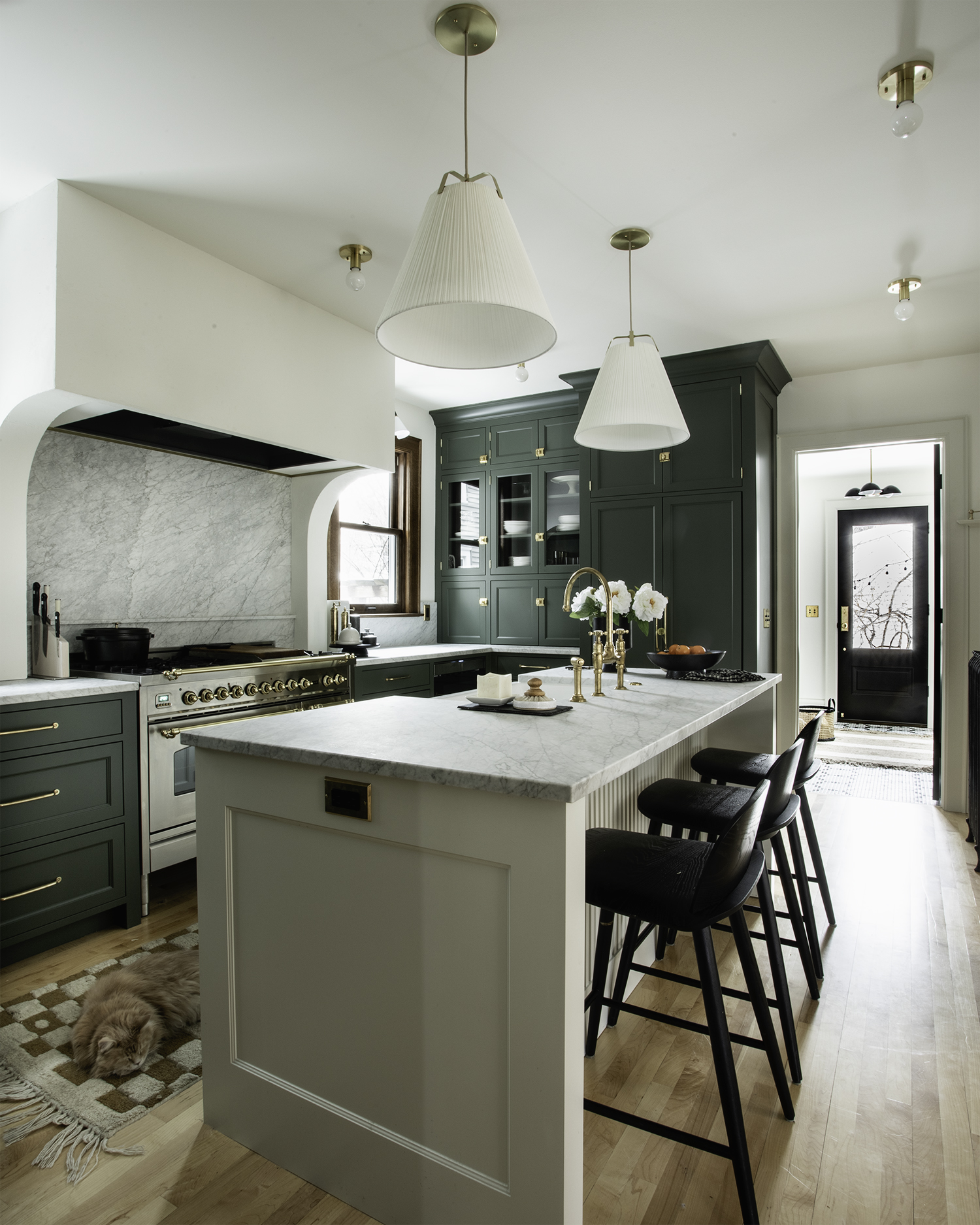 Historic Kitchen Renovation in Minneapolis view through the house to the mudroom, with island