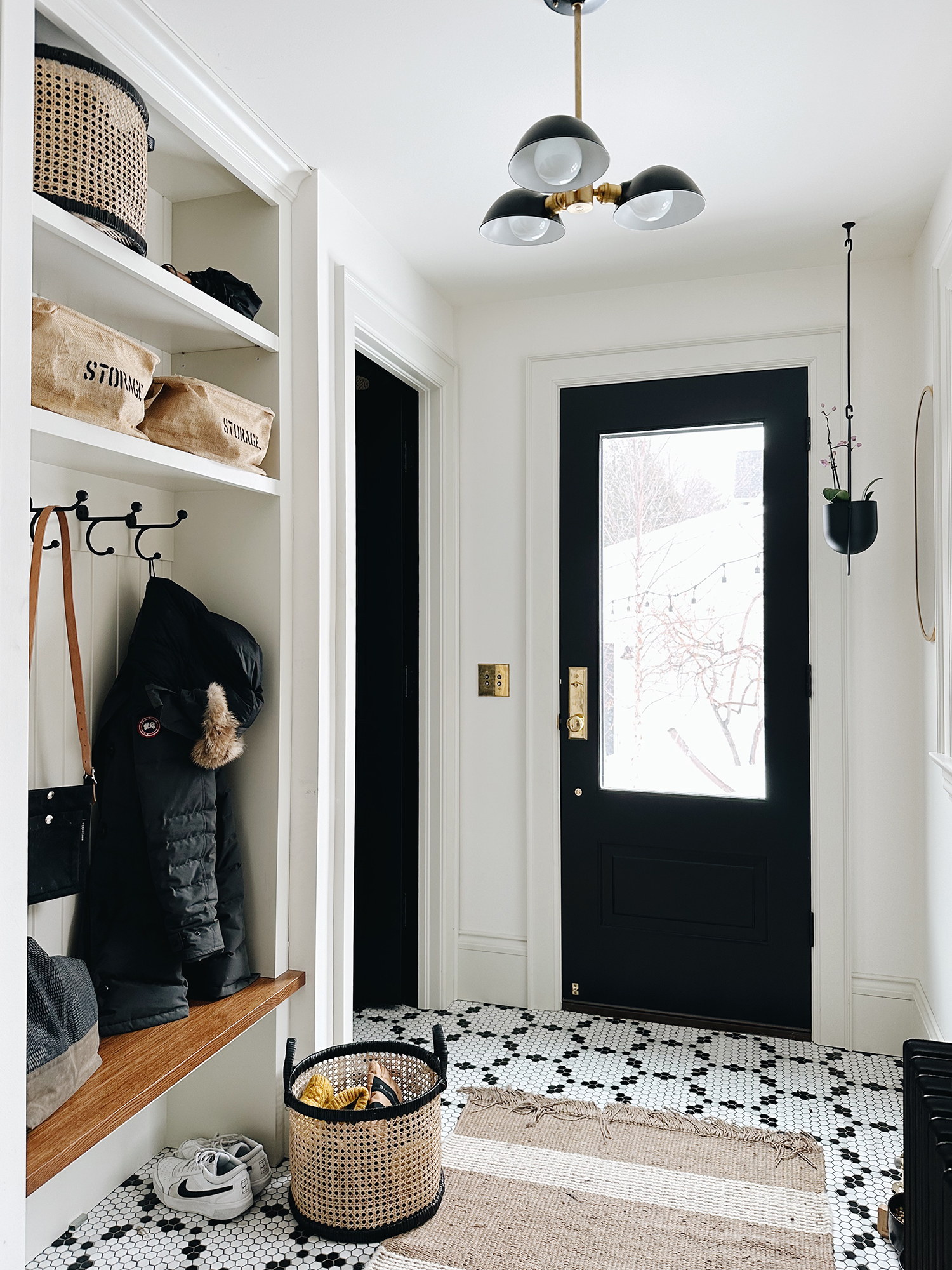Mudroom with Black and White hexagon tile floor