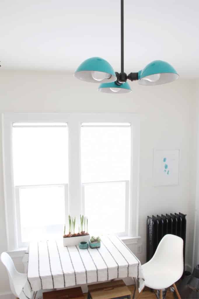 A new Schoolhouse Electric light fixture in the kitchen